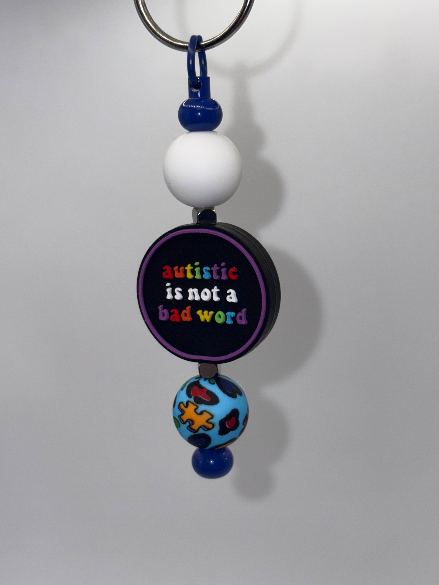 Autism Awareness Keychain – “Autistic is Not a Bad Word”