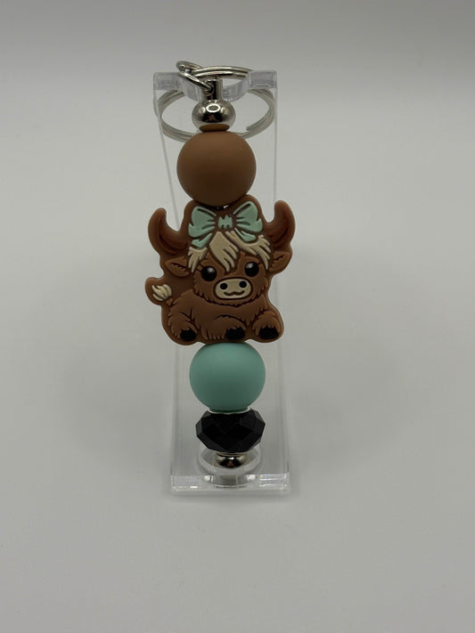 Highland Cow Keychain with Mint Bow – Sweet, Stylish & Adorable